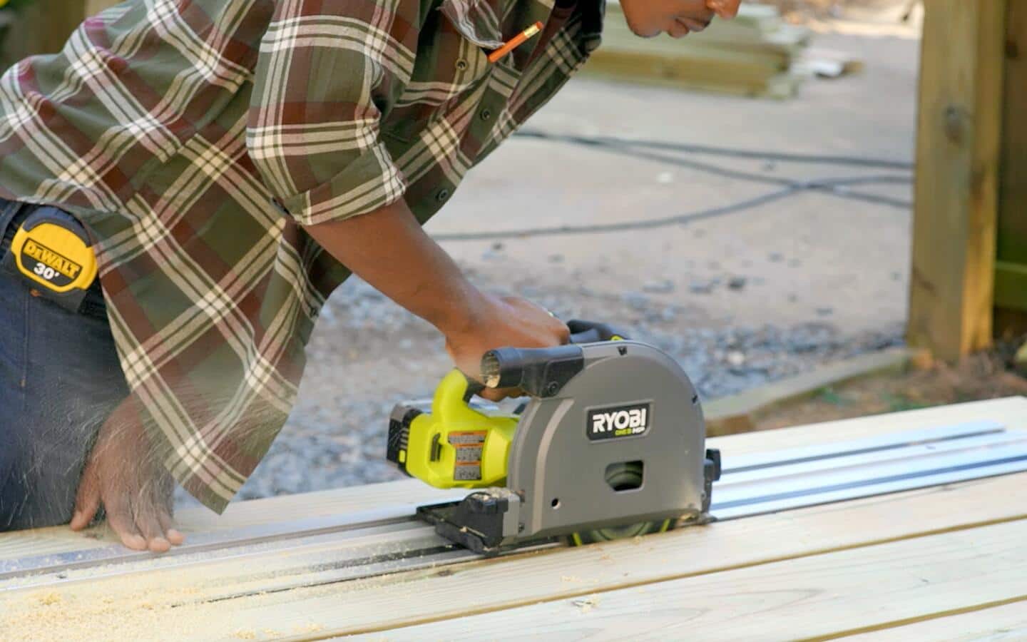 Cutting a hole for a cooler in the top of a picnic table, using a battery powered track saw. Cutting a hole for a cooler in the top of a picnic table, using a battery powered track saw.