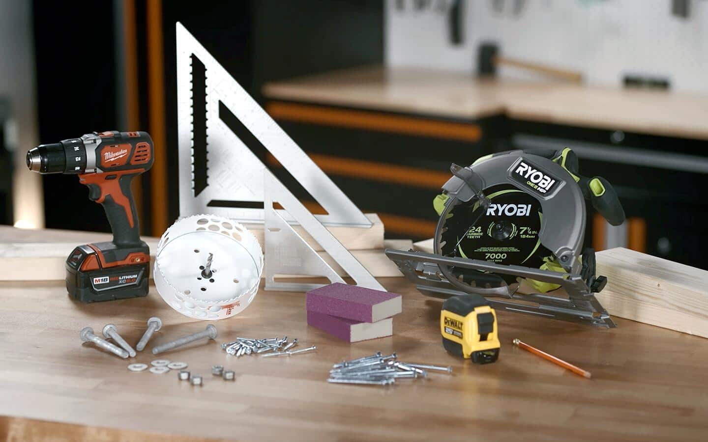 A saw and other tools sitting on a table. A saw and other tools sitting on a table.