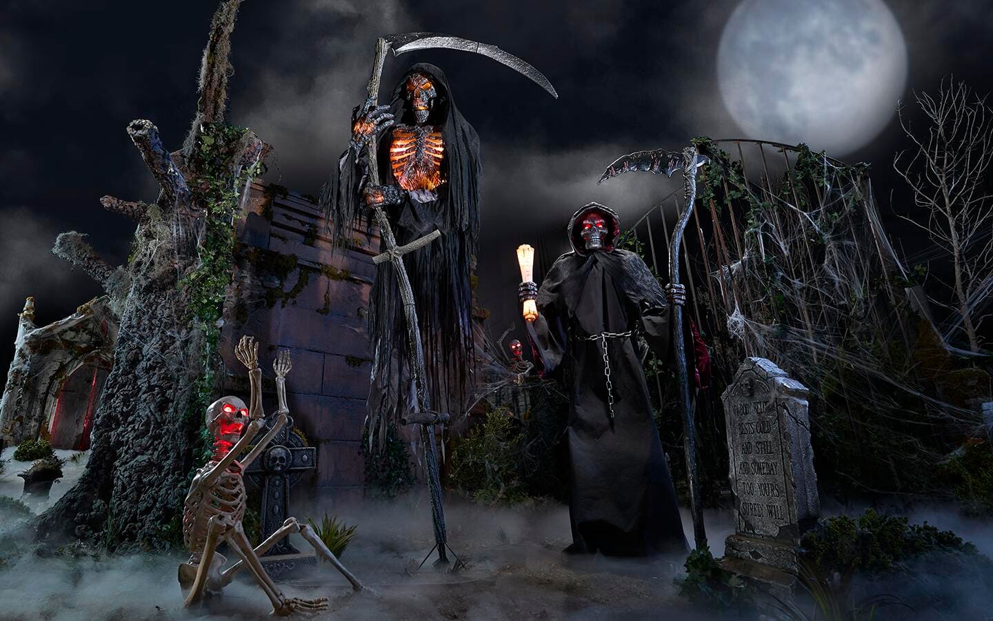 Giant Halloween figures, including a floating reaper and a standing reaper. Giant Halloween figures, including a floating reaper and a standing reaper.