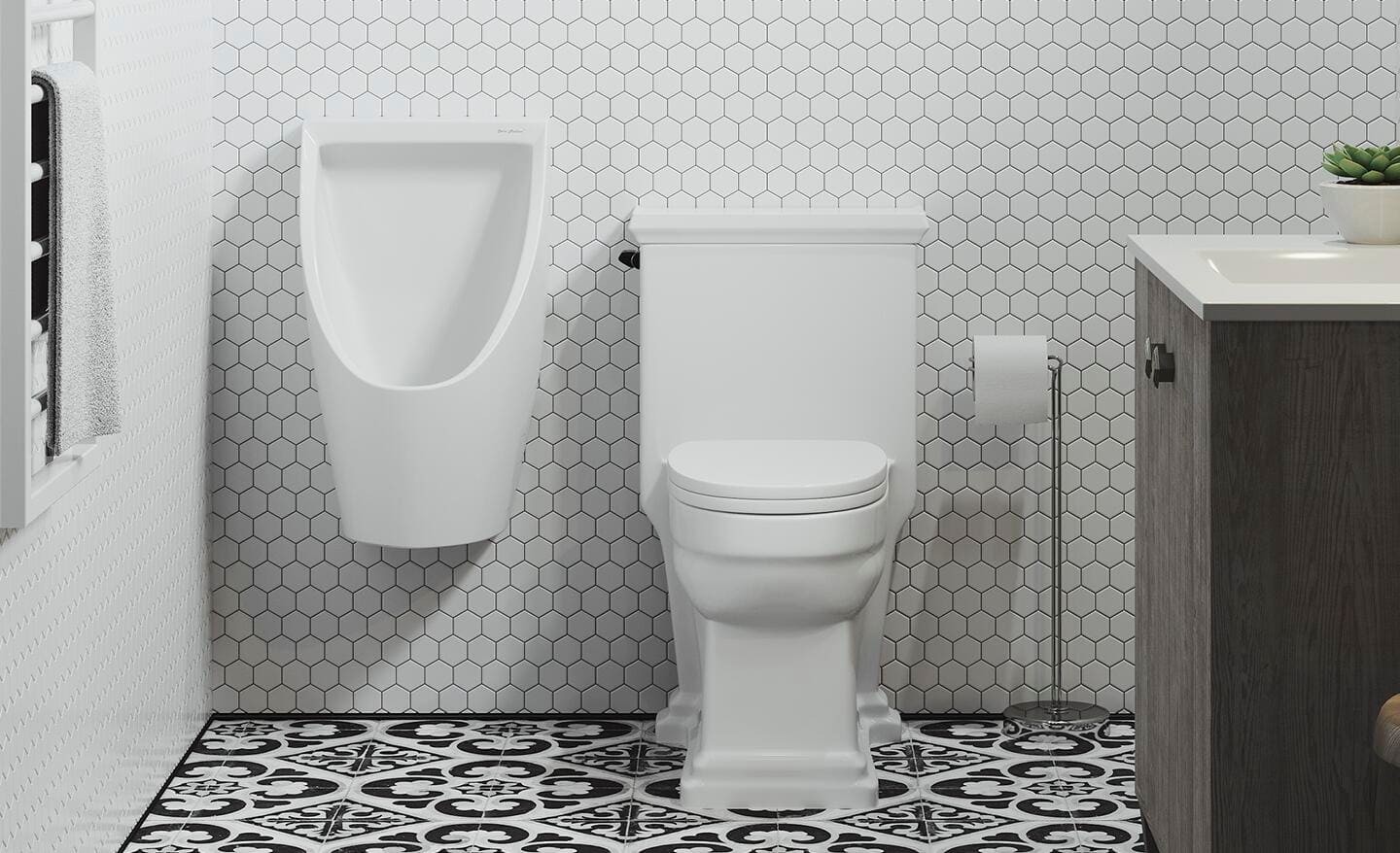 A white urinal installed next to a two-piece toilet.