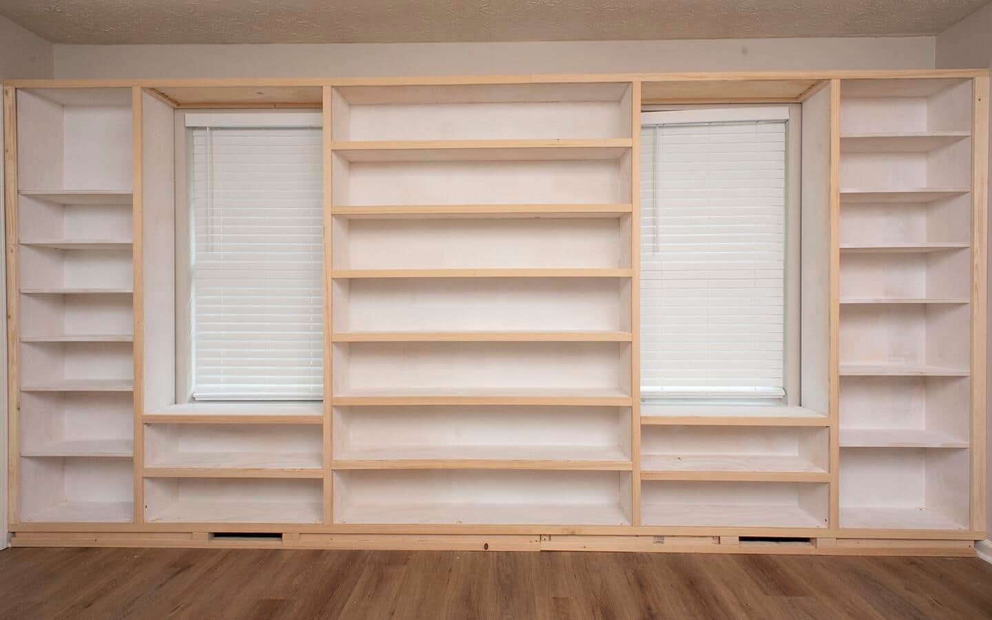 The face frame of a built in shelving unit.