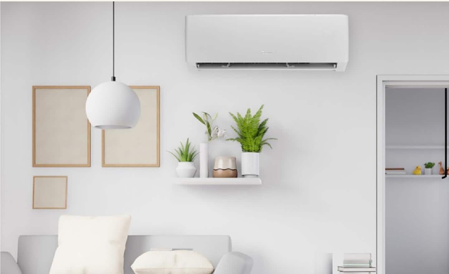 A ductless mini-split air conditioner installed on a wall near a living room ceiling.
