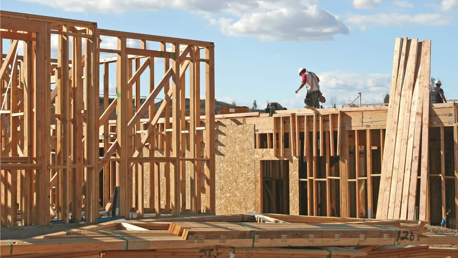 A Pro works on the framing of a new house.