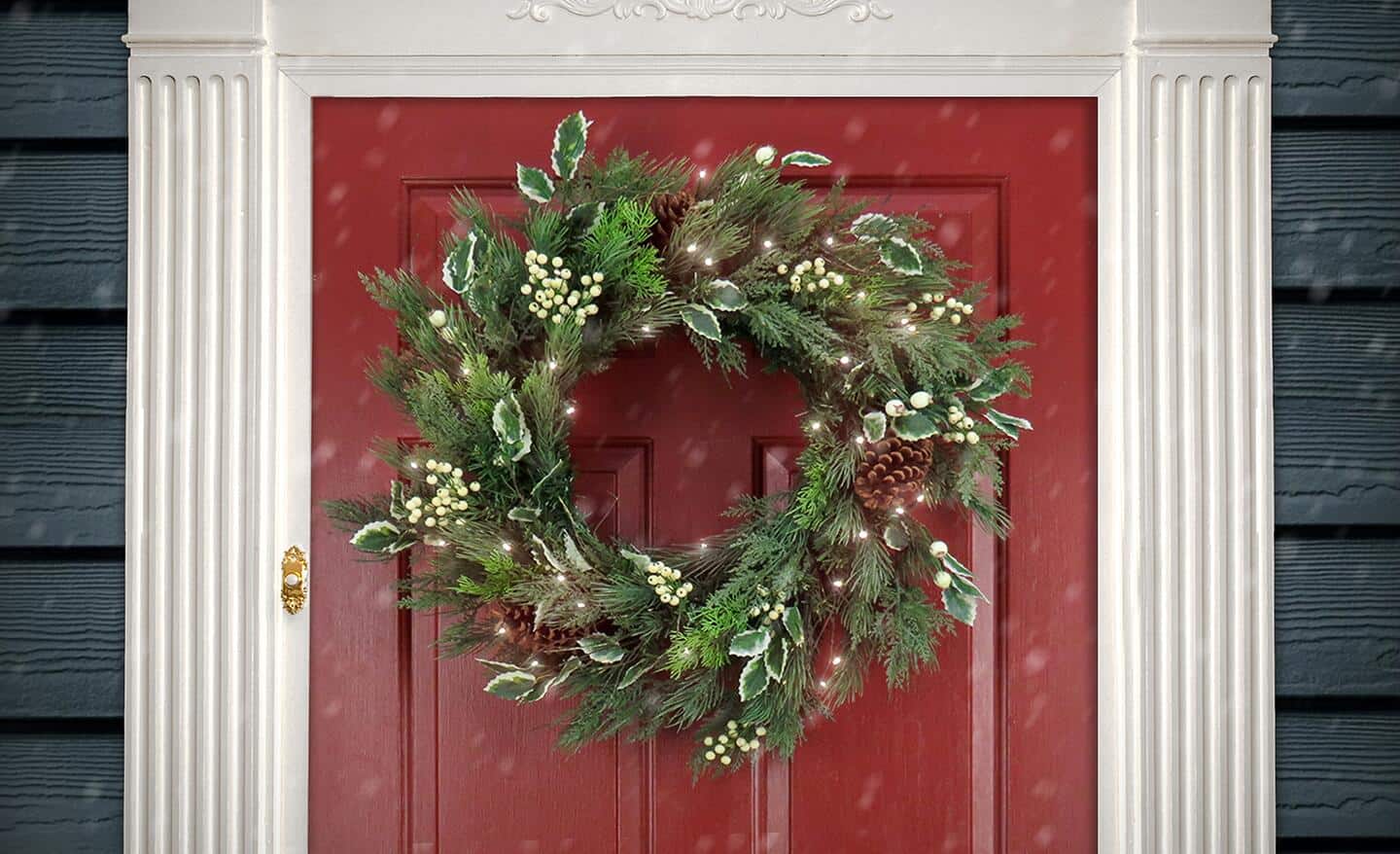 A holly and pine wreath. A holly and pine wreath.