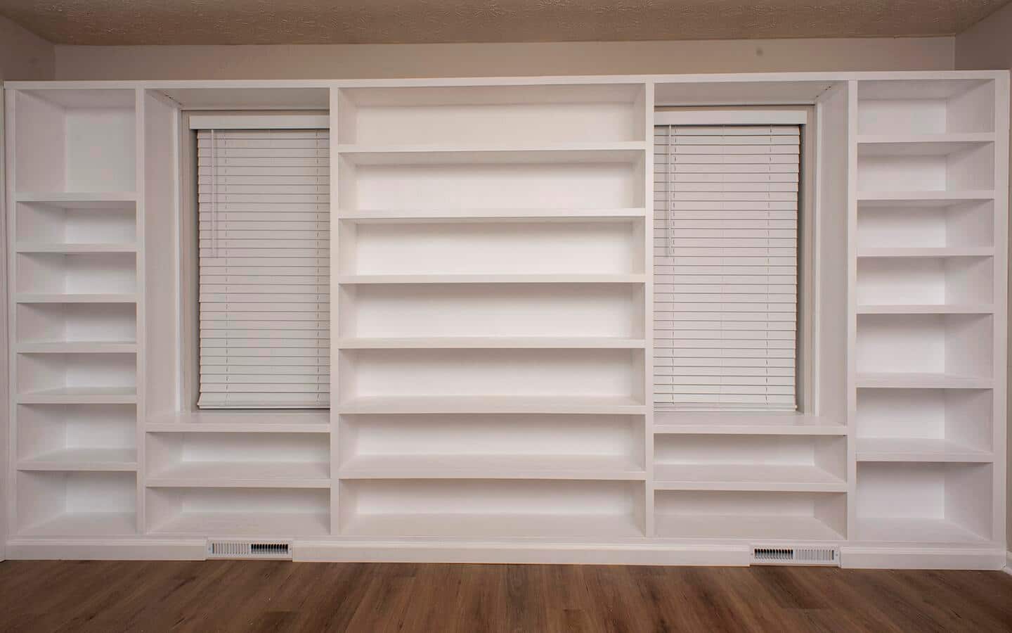 The built in shelving unit is in place and painted.