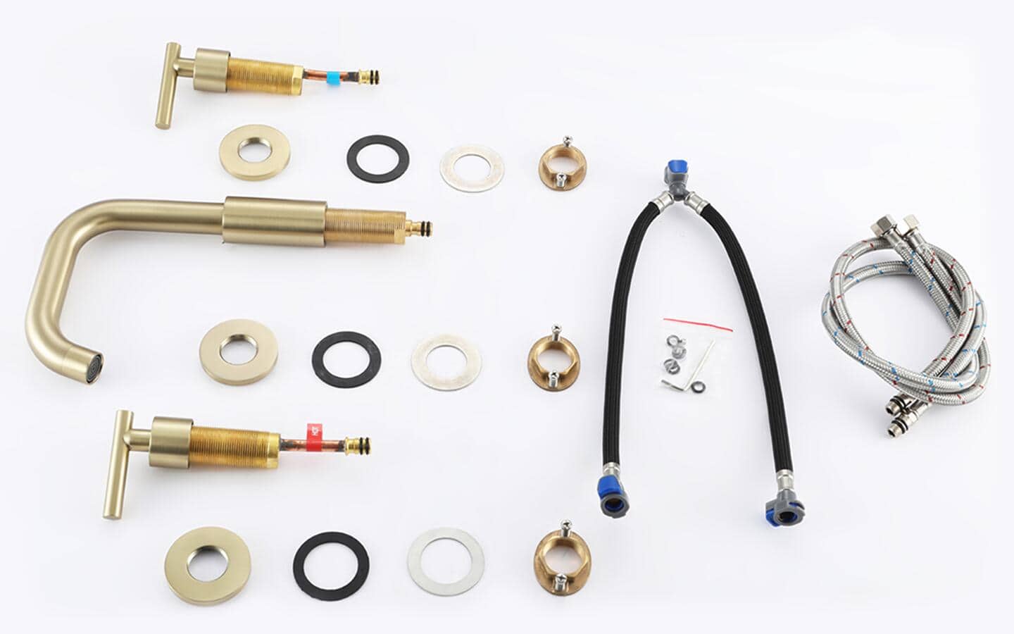 Assorted tools and parts needed to fix a sink spread out on a table. Assorted tools and parts needed to fix a sink spread out on a table.