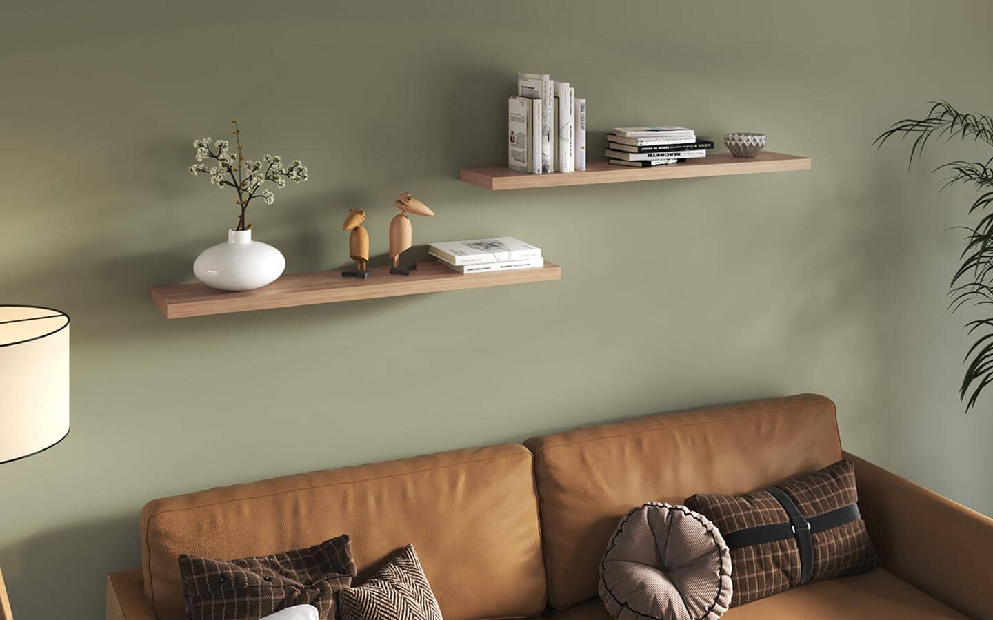 Two floating shelves hang on a wall with knick-knacks on them Two floating shelves hang on a wall with knick-knacks on them