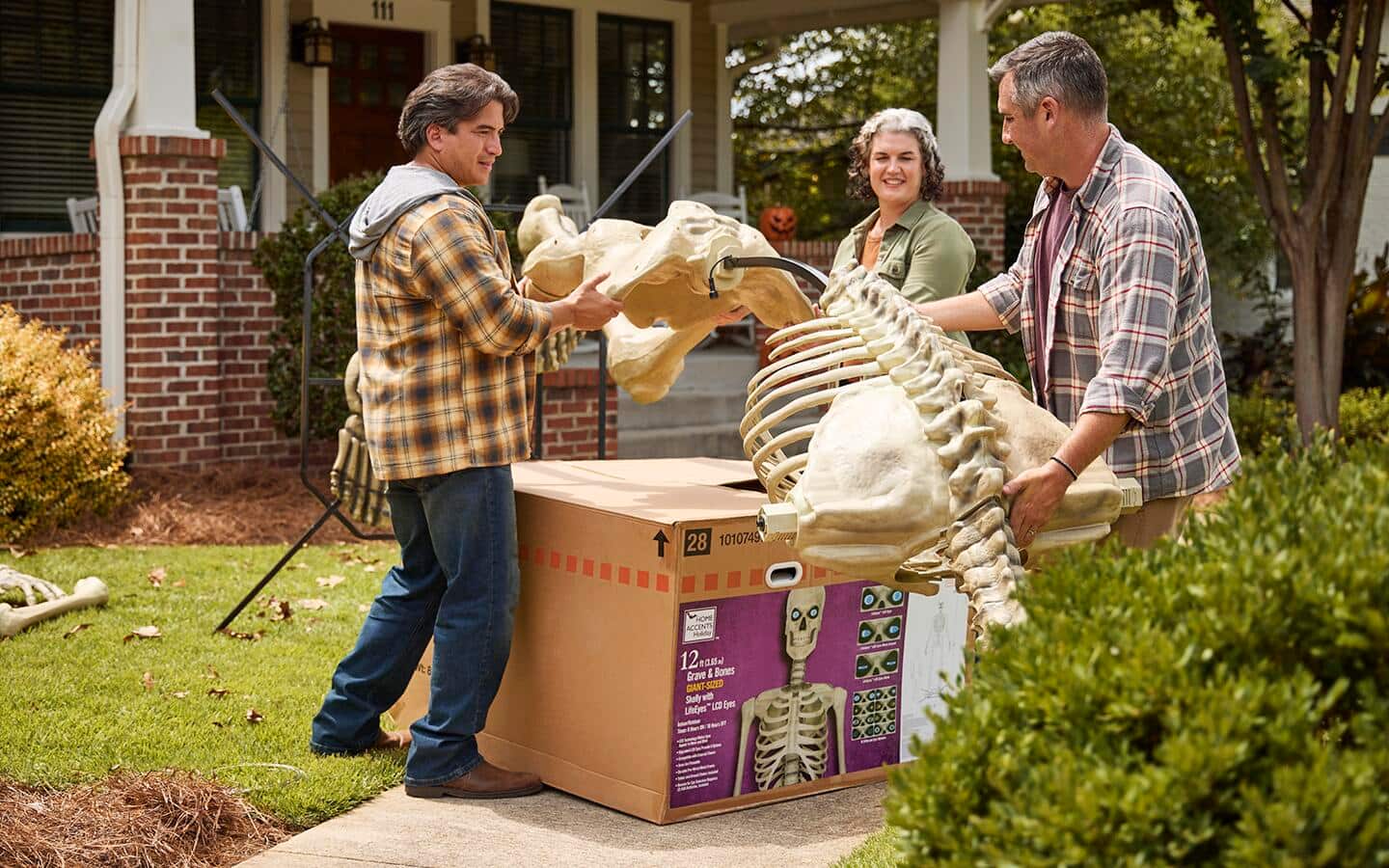 Three people slide the ribcage onto the skeleton. Three people slide the ribcage onto the skeleton.