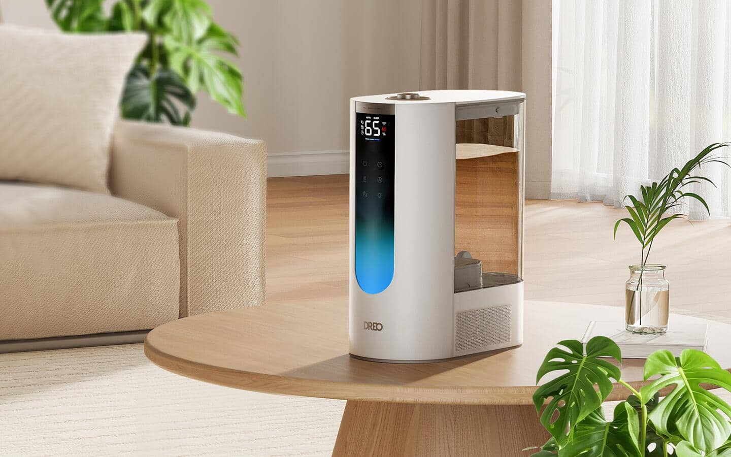 An air cleaning machine sits on a coffee table in a modern living room. An air cleaning machine sits on a coffee table in a modern living room.