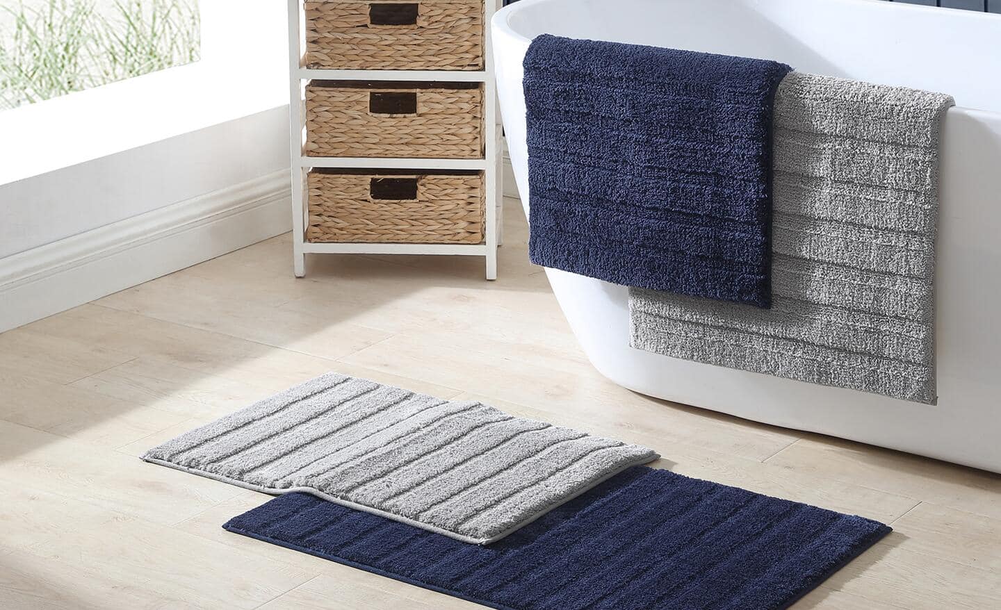 Several different mats placed in a bath.