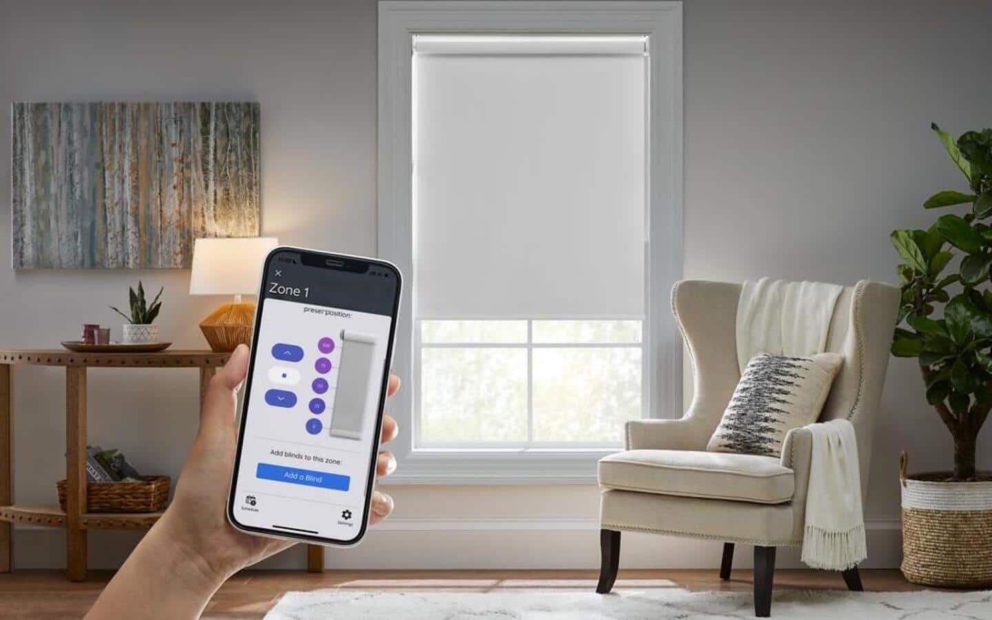 A person using a phone app to operate smart blinds in family room.