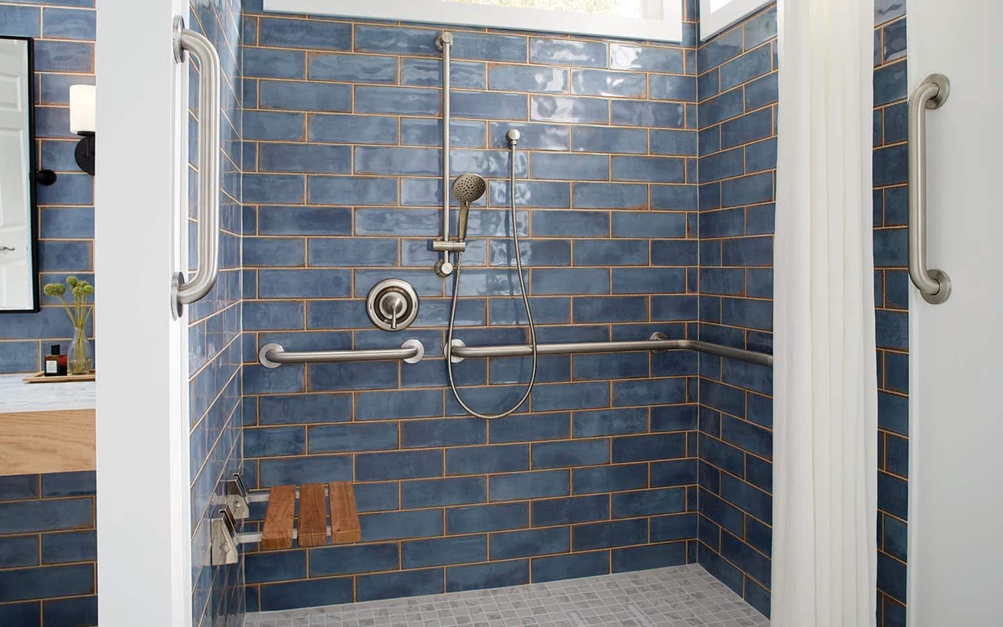 A shower with many grab bar options. A shower with many grab bar options.
