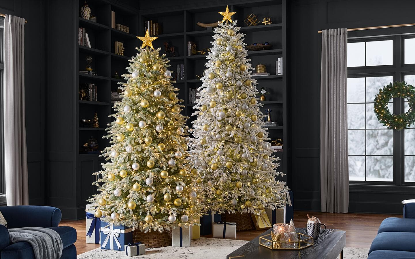 A pair of flocked artificial Christmas trees.