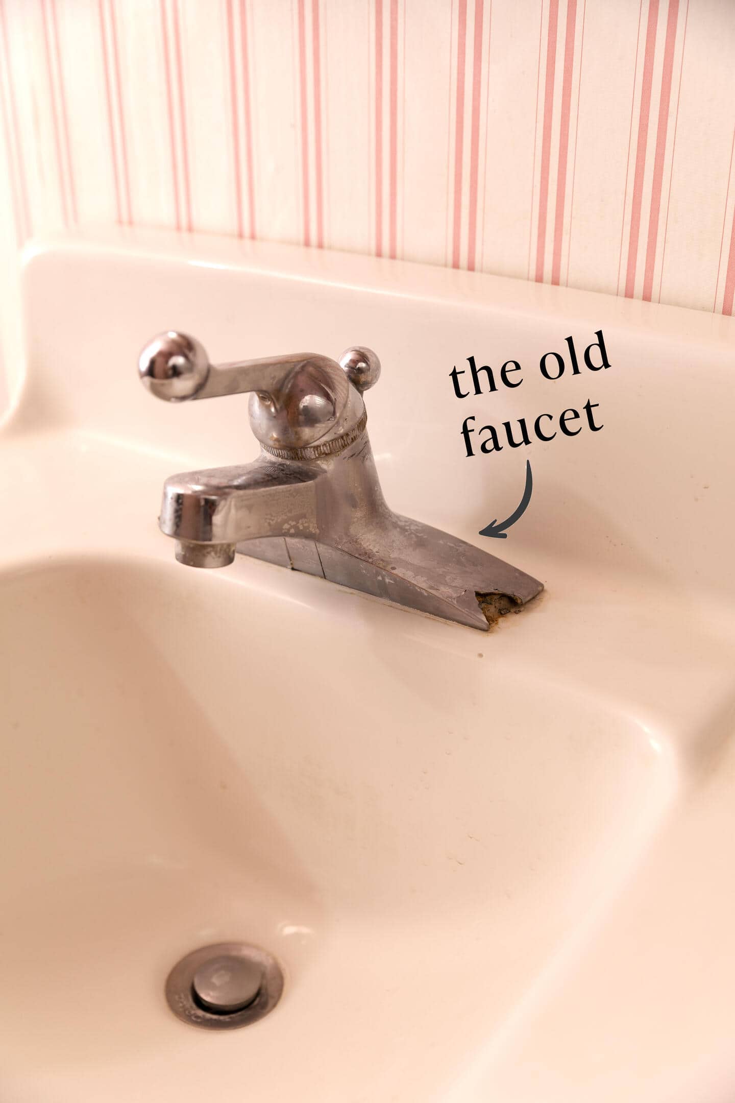 Close-up of the old faucet.
