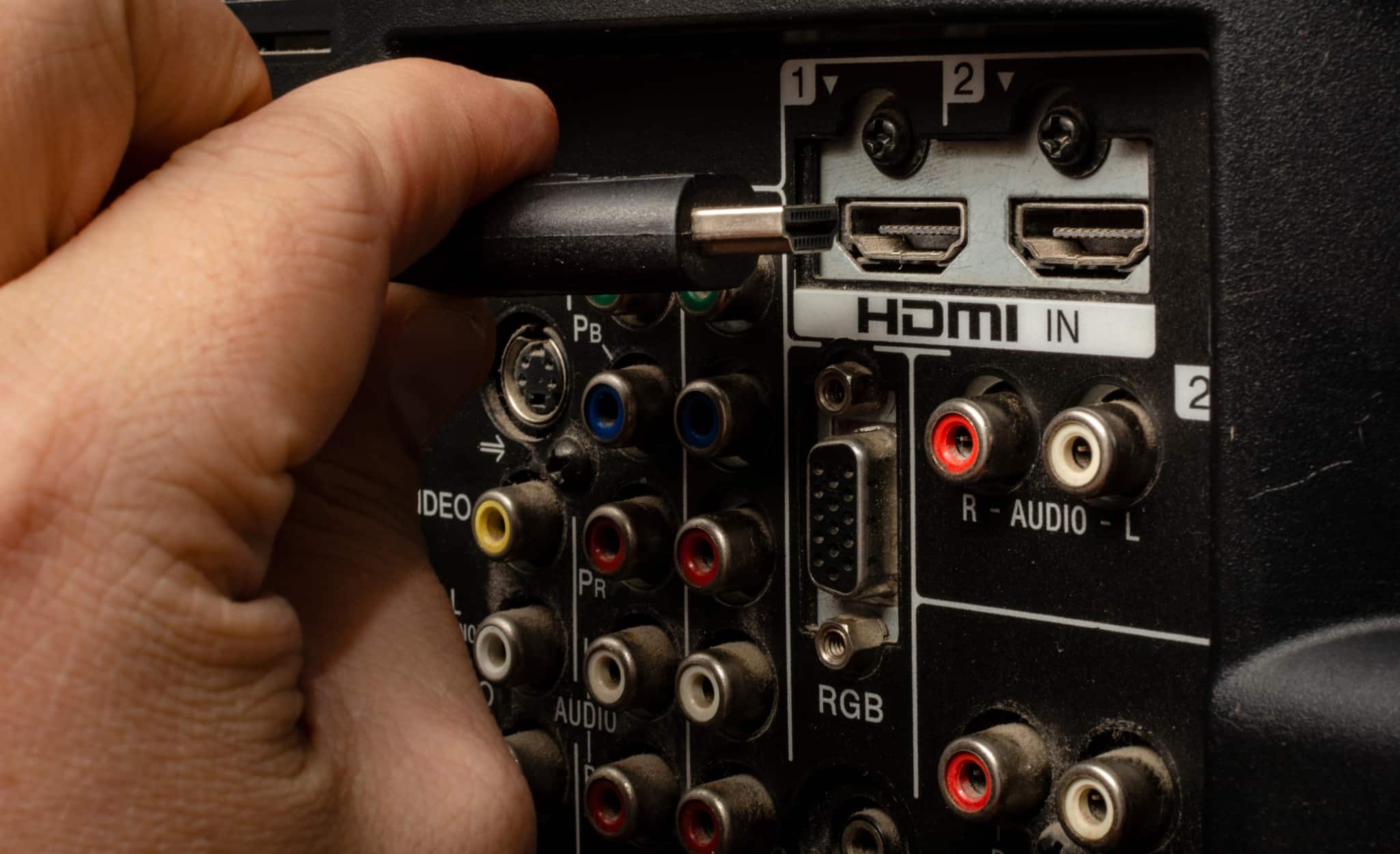 HDMI ports at the back of a widescreen TV.