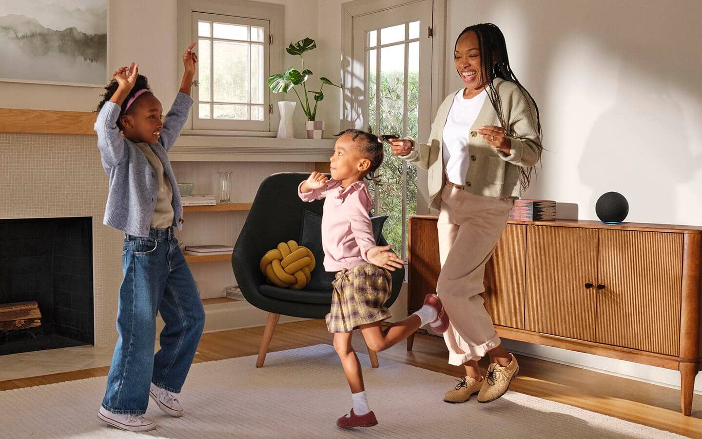A family listening to music and dancing in the living room. A family listening to music and dancing in the living room.