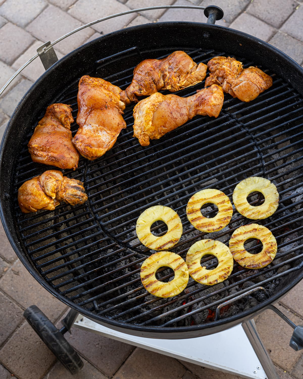 Chicken and pineapple on a grill. Chicken and pineapple on a grill.