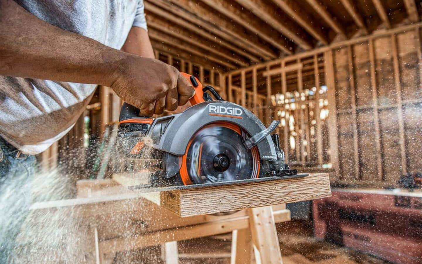 Sawdust fills the air as a piece of LVL is cut with a circular saw. Sawdust fills the air as a piece of LVL is cut with a circular saw.