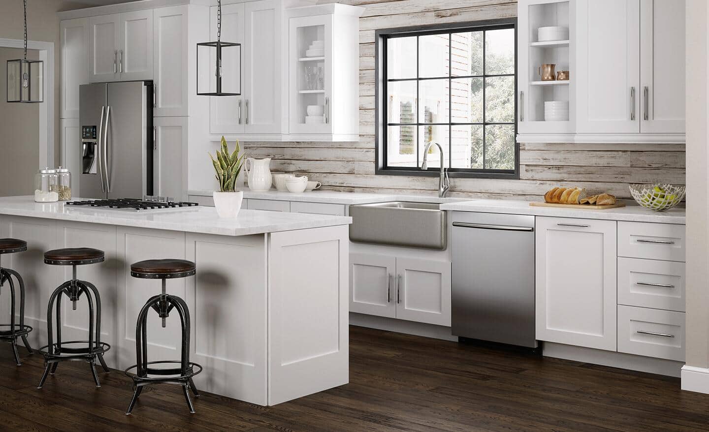 A kitchen featuring white plywood shaker cabinets.