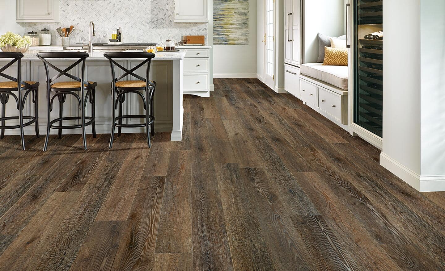A kitchen with beautiful vinyl plank flooring.