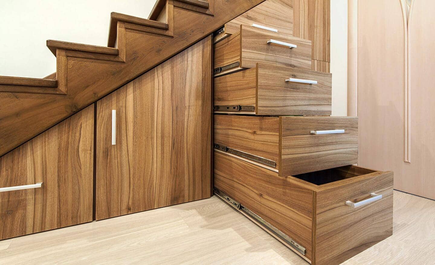 A staircase contains built-in storage.