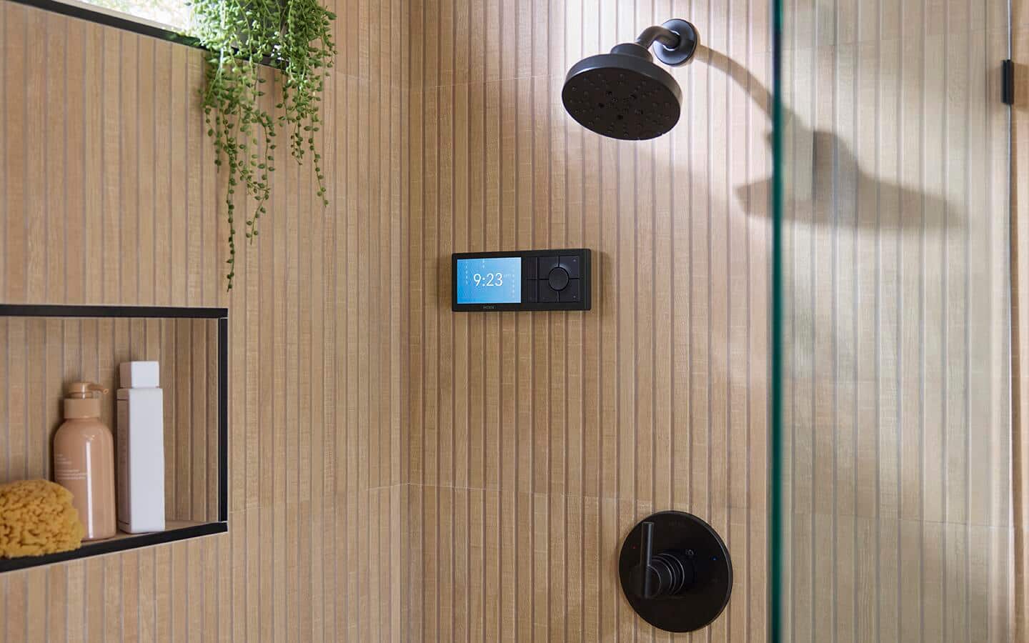 A home shower stall with a smart shower head feature