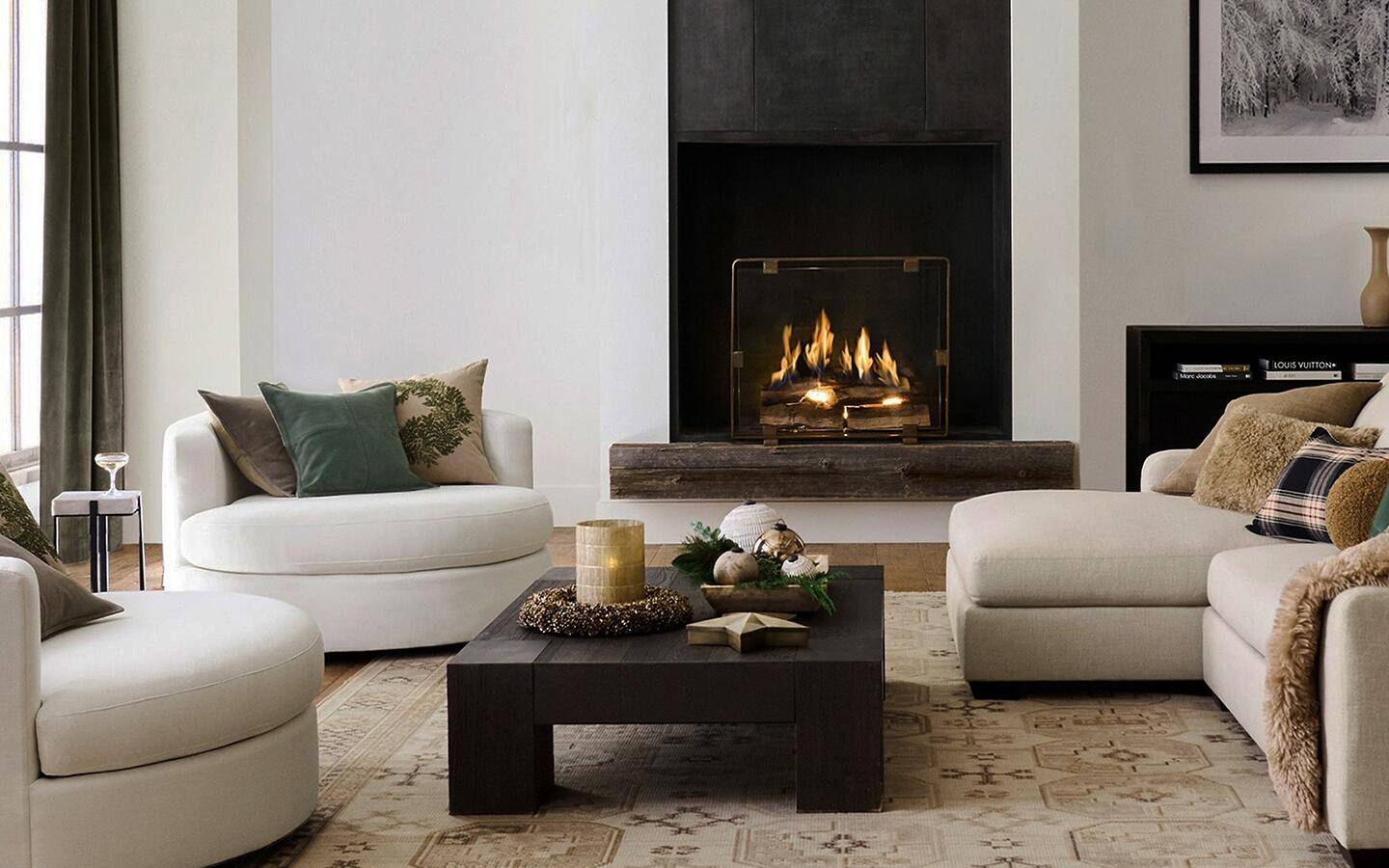 A fireplace surrounded by a black accent feature. A fireplace surrounded by a black accent feature.