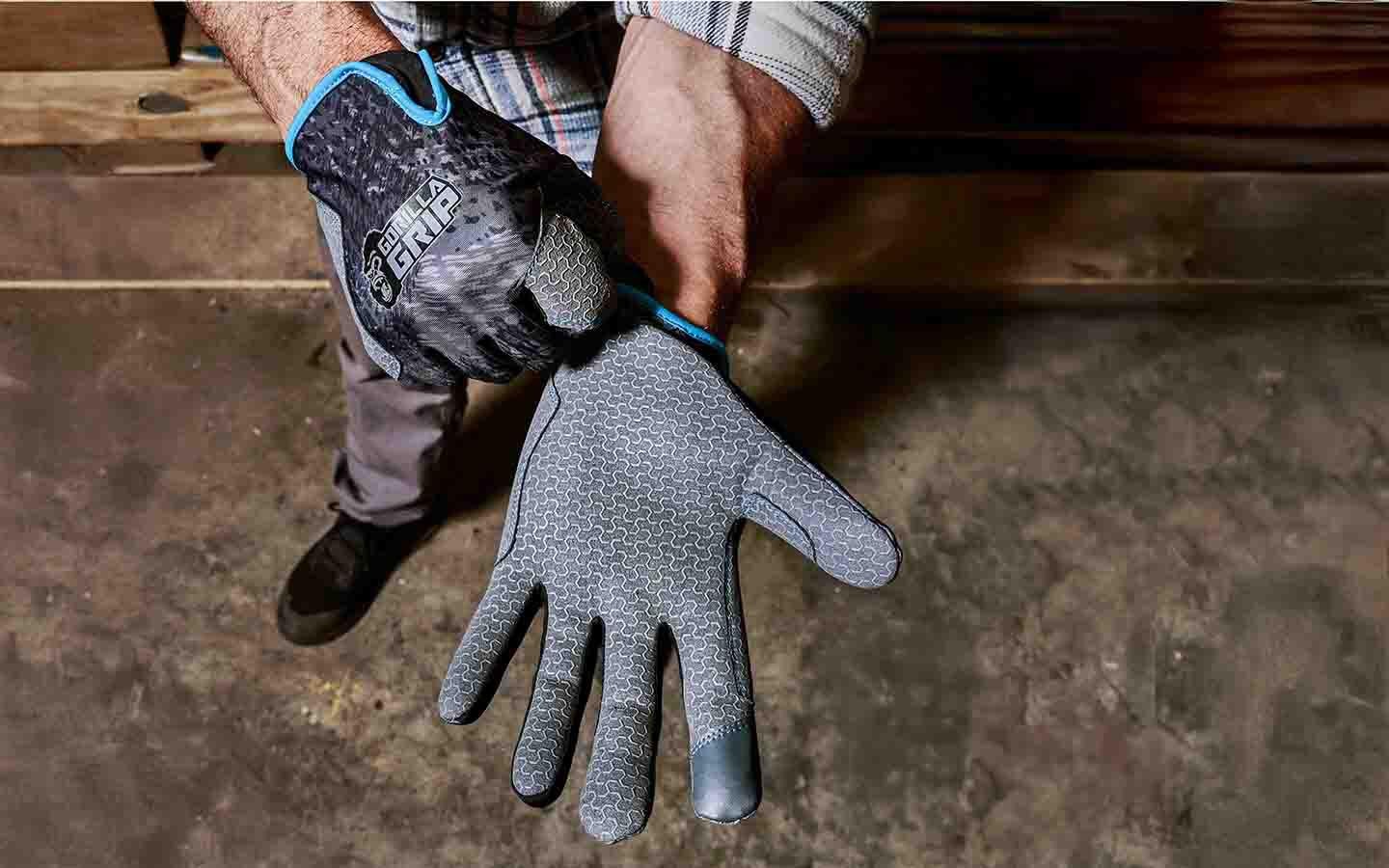 A person pulling on stretchy work gloves.