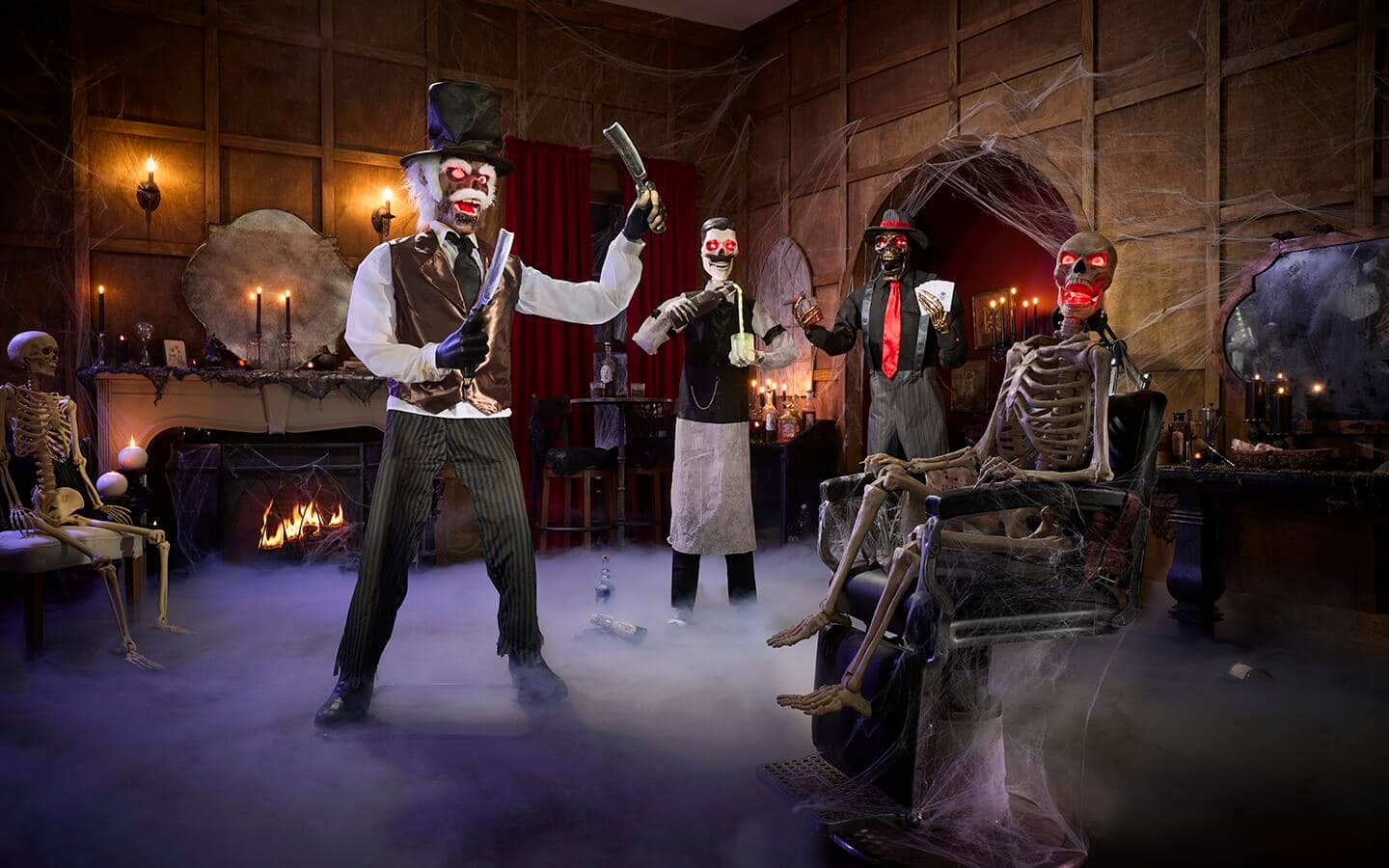A collection of indoor Halloween figures with glowing eyes in a Halloween scene. A collection of indoor Halloween figures with glowing eyes in a Halloween scene.