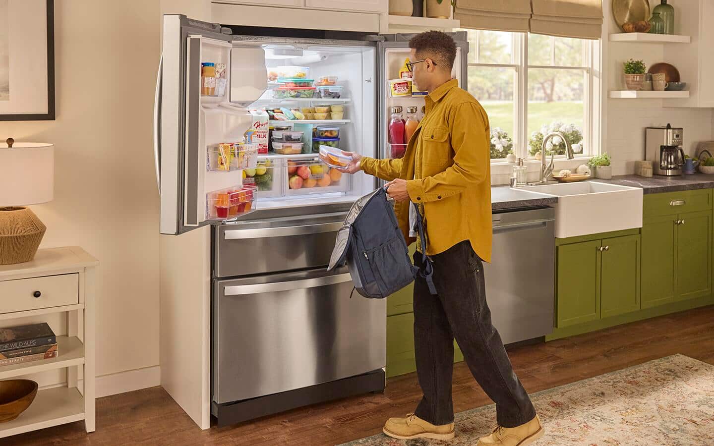 Someone reloading a refrigerator.