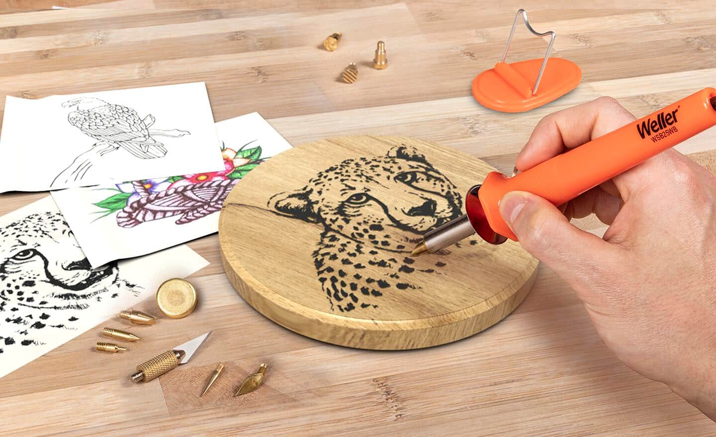 Pyrography, wood burning, with a soldering iron.