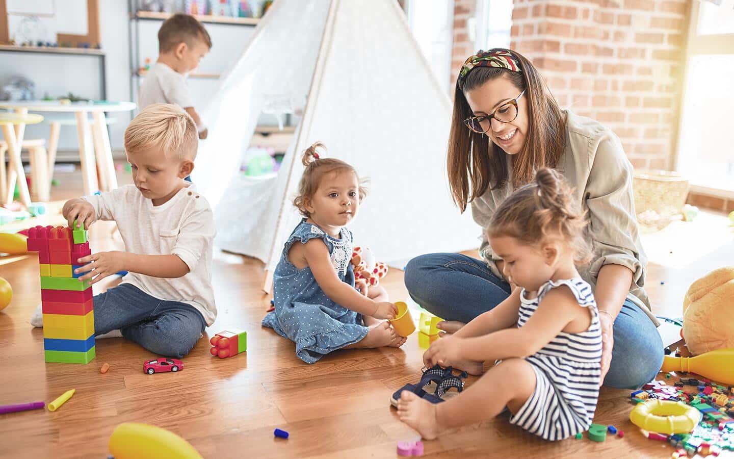 Kids playing in a playroom.