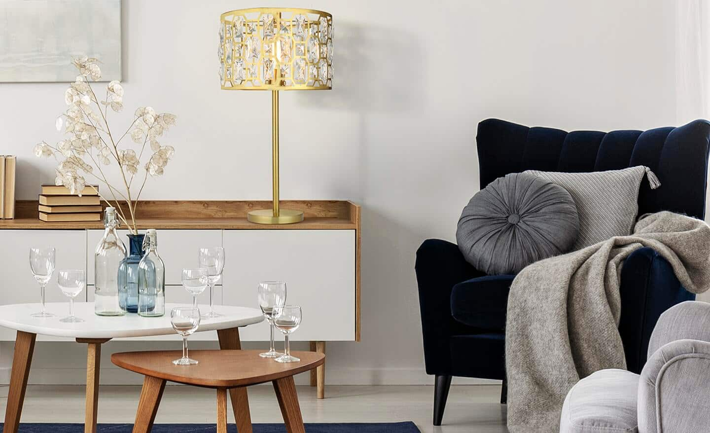 A white candlestick on a side table. 