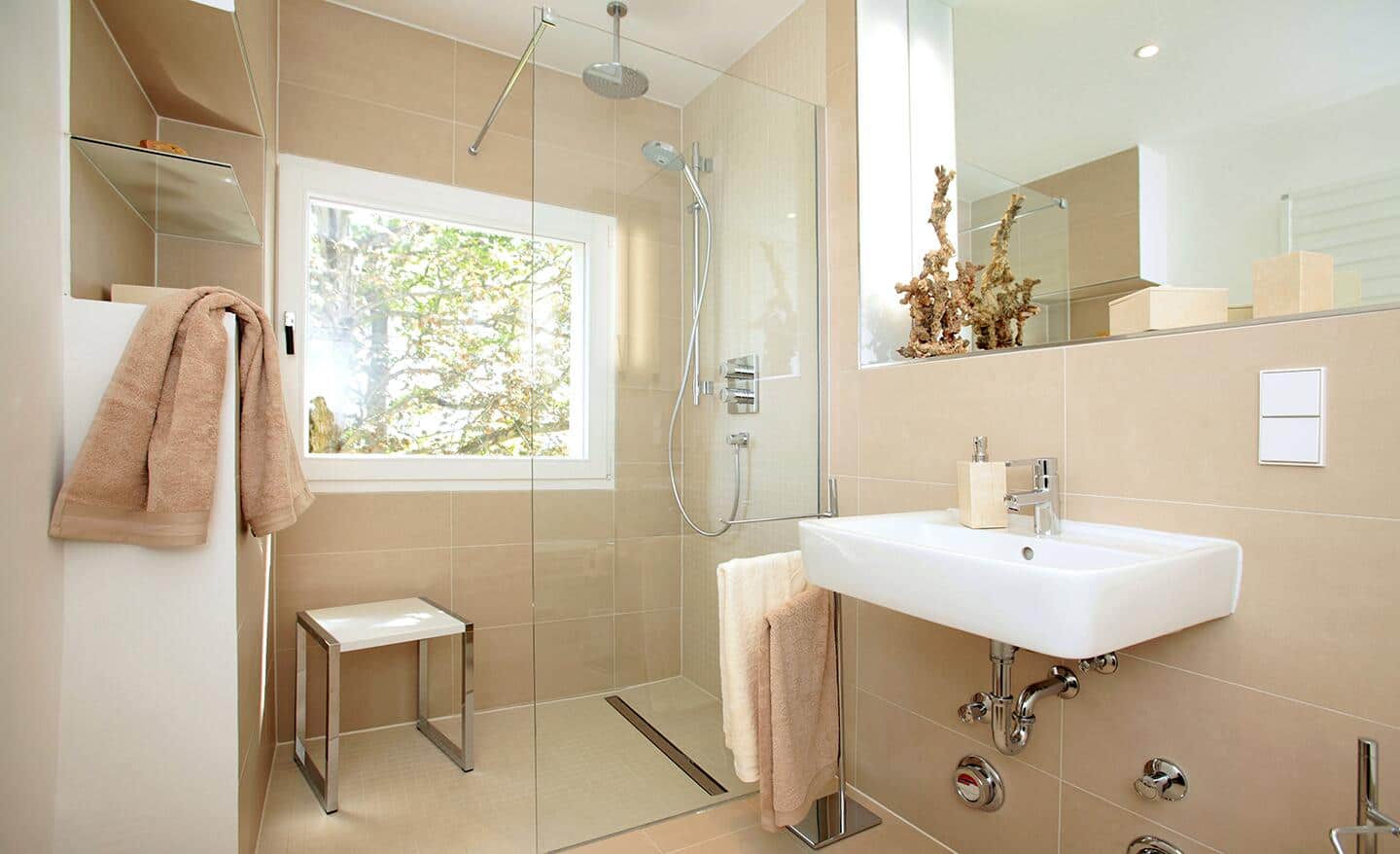 A walk-in small bath installed with a fixed panel shower door.