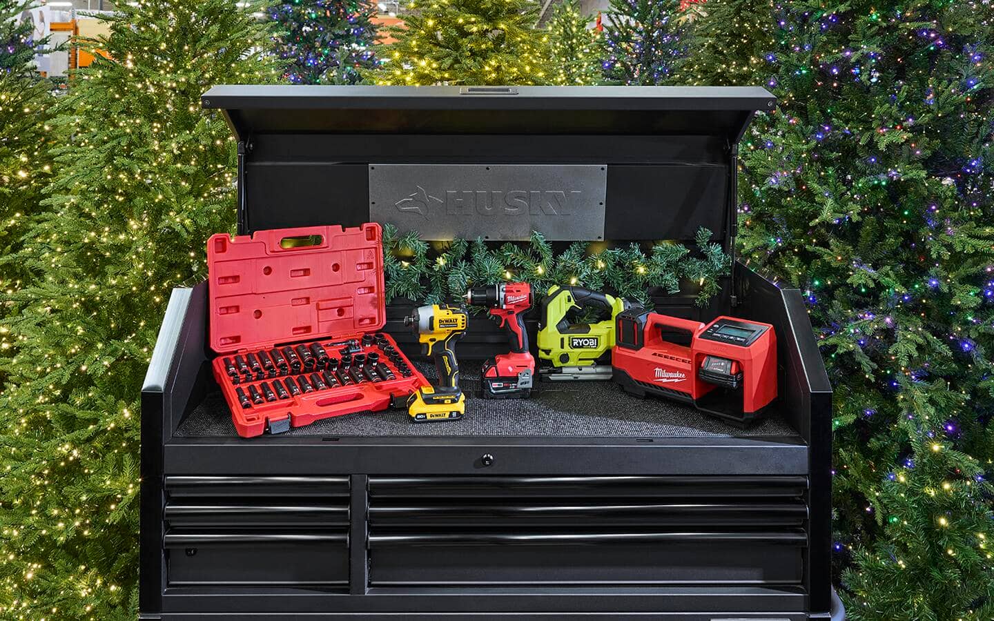 A variety of power tools placed on top of a tool workbench. A variety of power tools placed on top of a tool workbench.