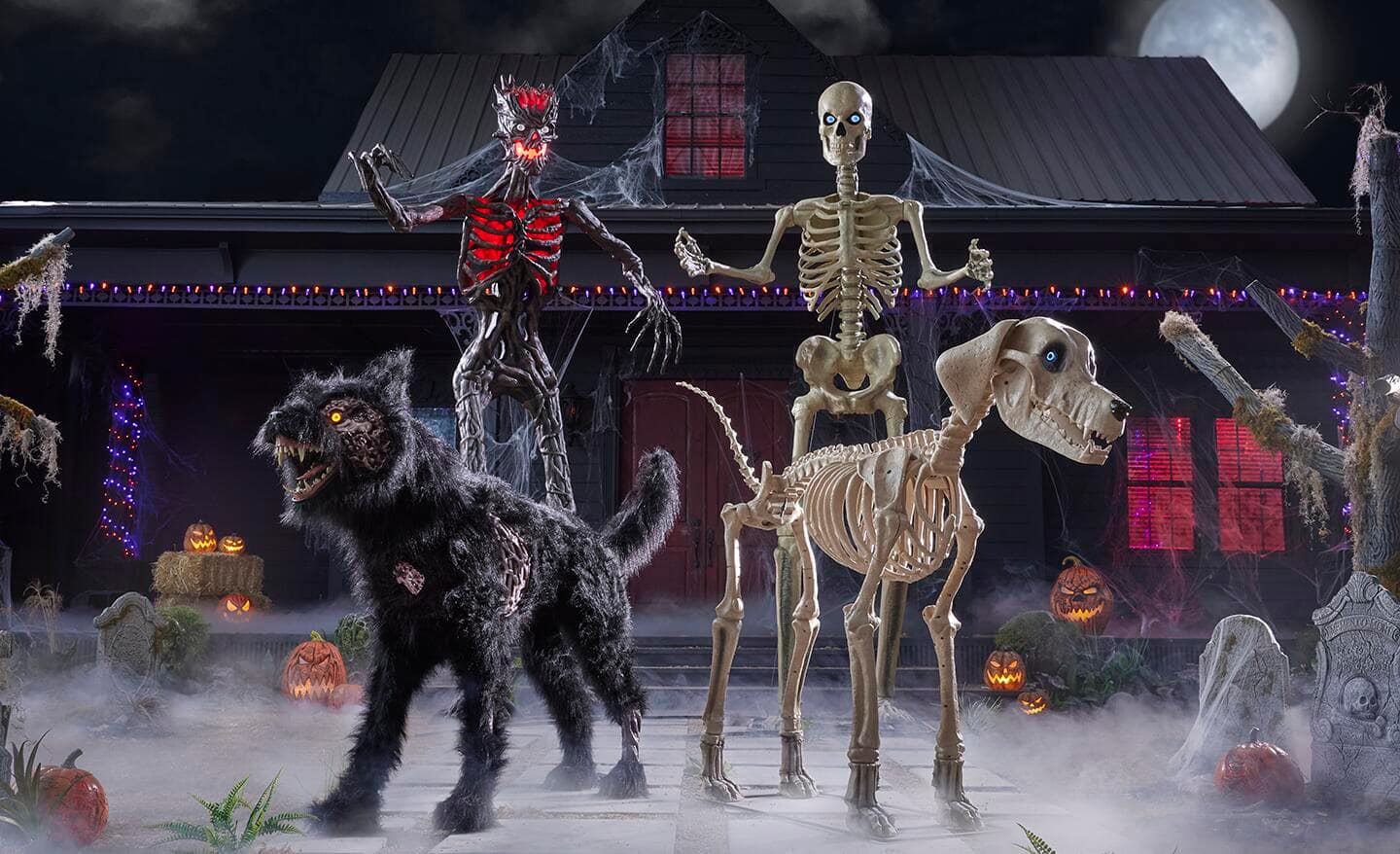 The 12-foot skeleton family with a skeleton dog and furry howling wolf.