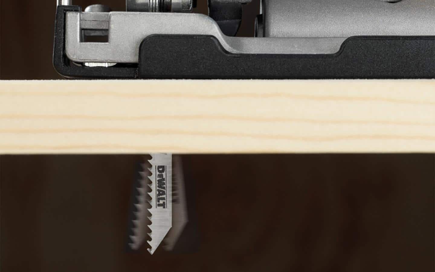 The jigsaw blades protrudes through the bottom of the workpiece. The jigsaw blades protrudes through the bottom of the workpiece.