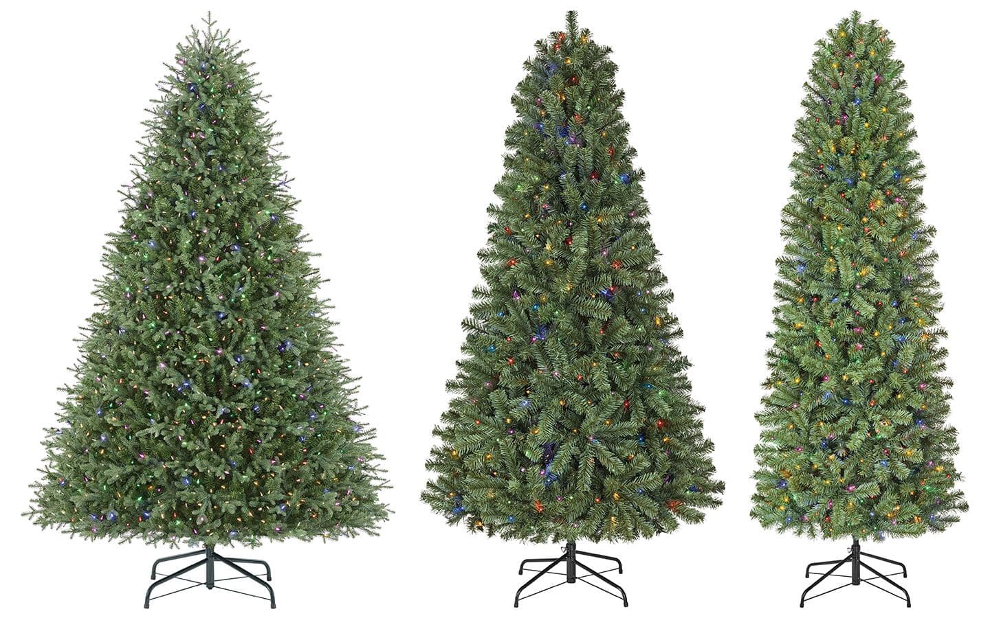 Three artificial Christmas trees displaying full, slim and medium widths.