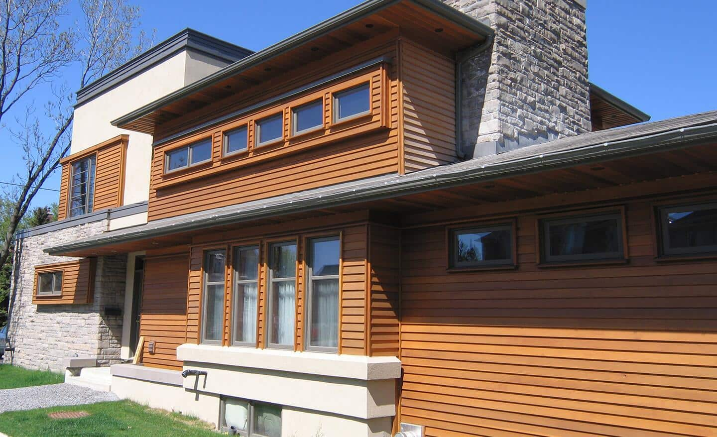 Wood siding resembling cedar installed on a home.