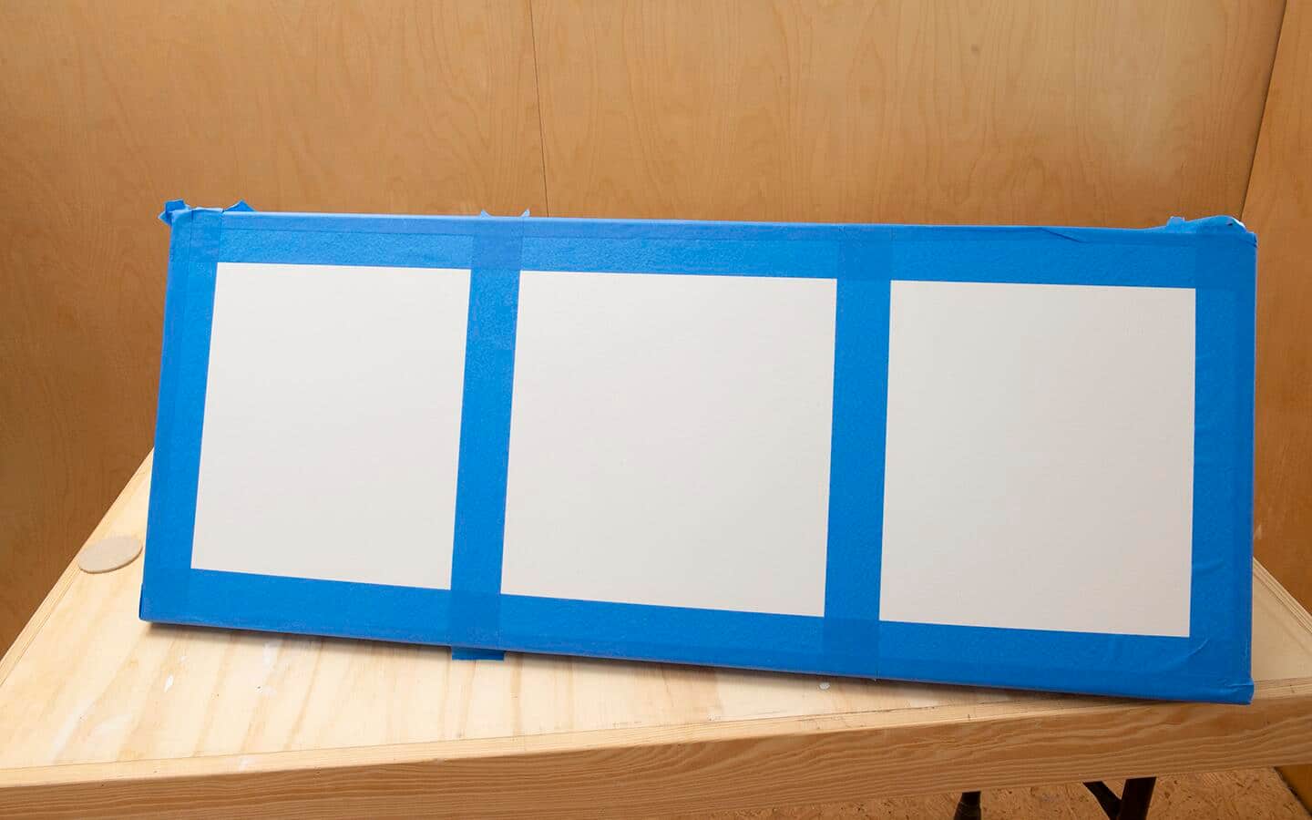 A soccer rebounder board that has been prepared for painting. A soccer rebounder board that has been prepared for painting.