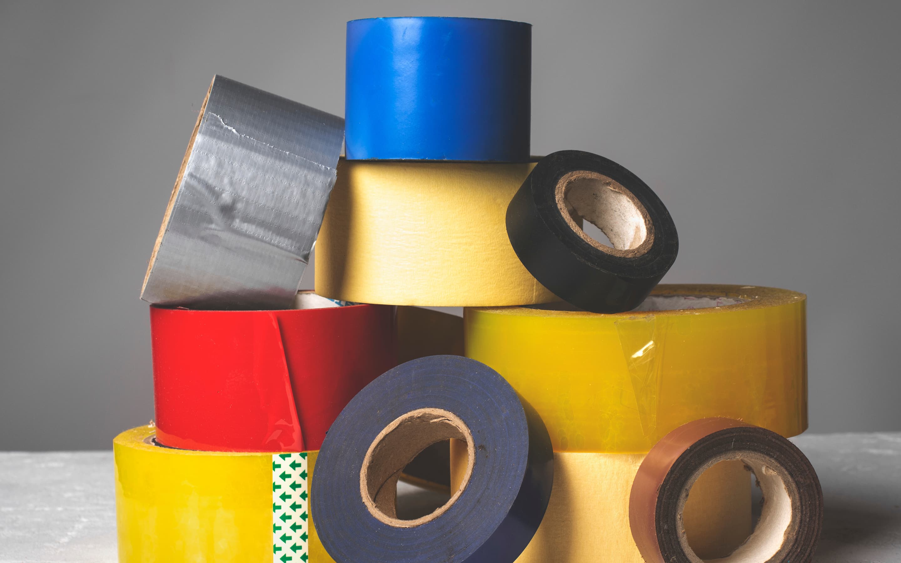 An assortment of different types and sizes of tape. An assortment of different types and sizes of tape.