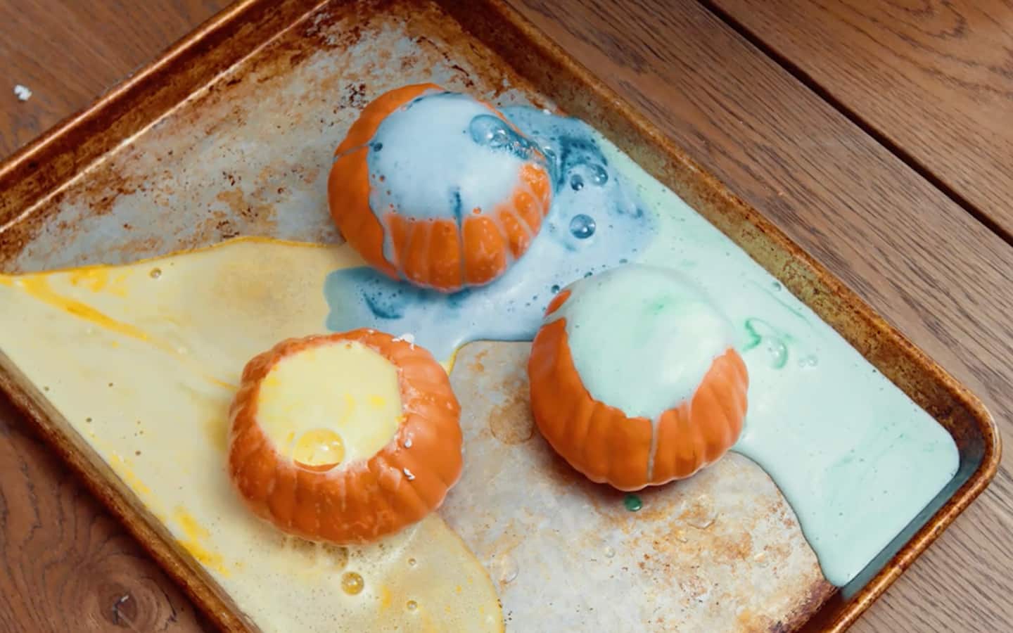 Different colored pumpkin volcanoes erupting. Different colored pumpkin volcanoes erupting.