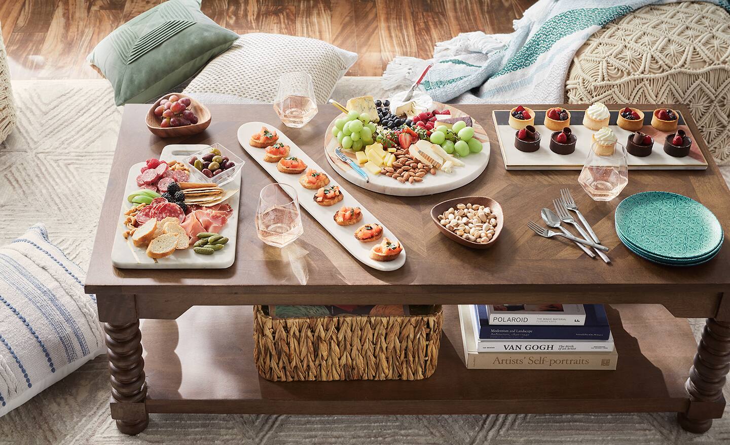 Coffee table set with trays of food for entertaining