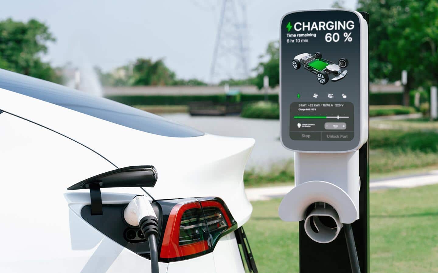 An EV charger stands in a parking lot. An EV charger stands in a parking lot.