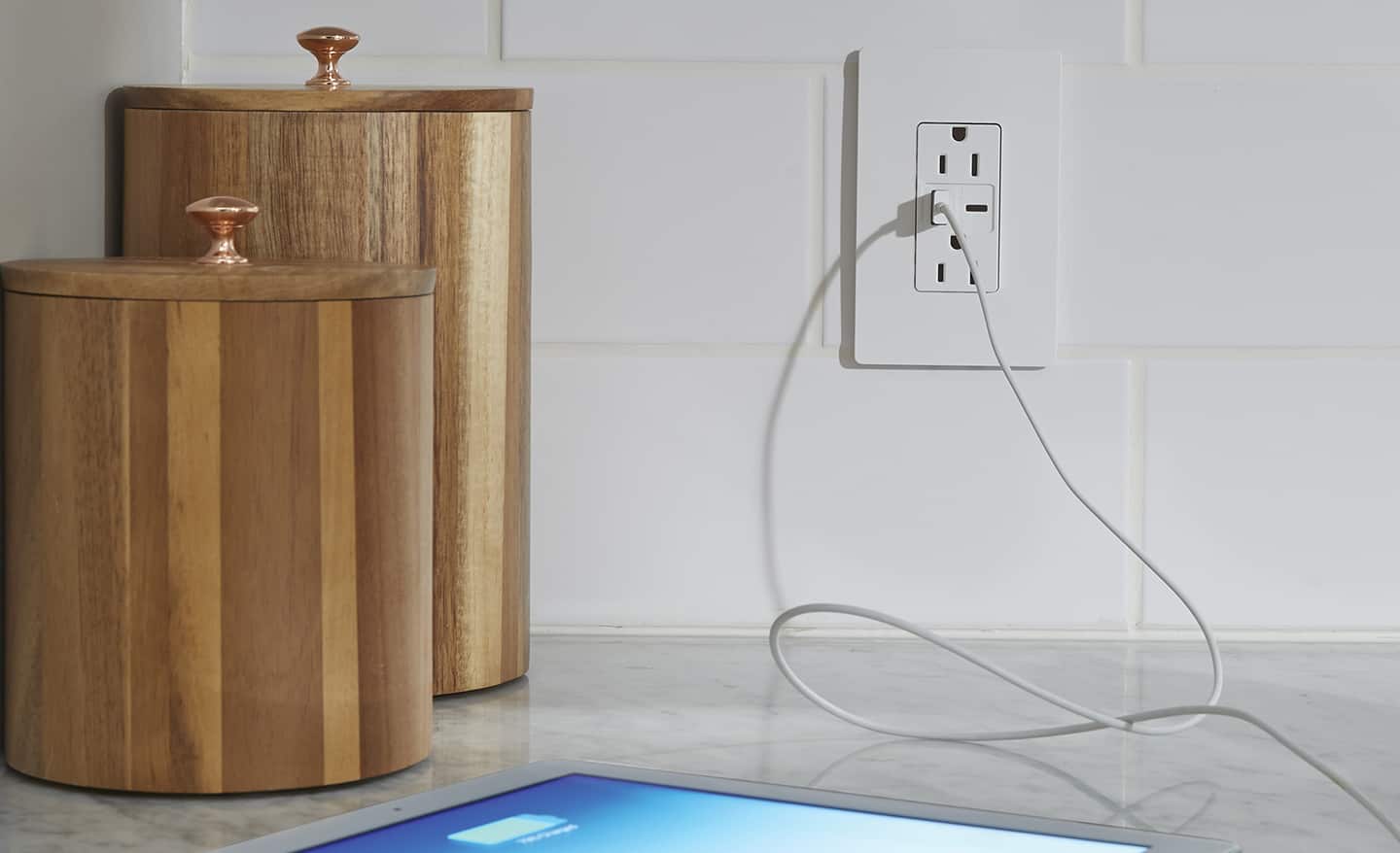 A USB combination outlet installed over a countertop.