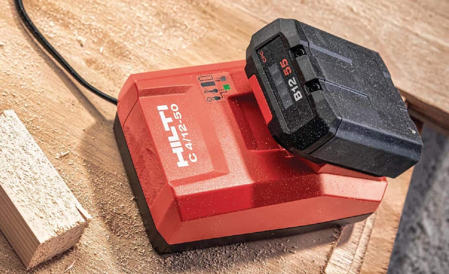 A 22 volt cordless tool battery on a charger.