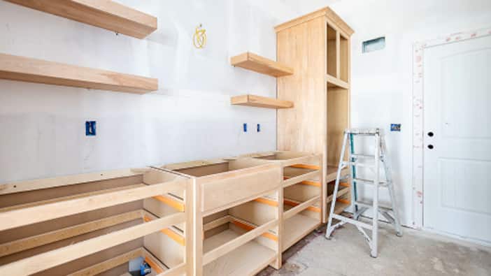 A kitchen is in the process of being remodeled.