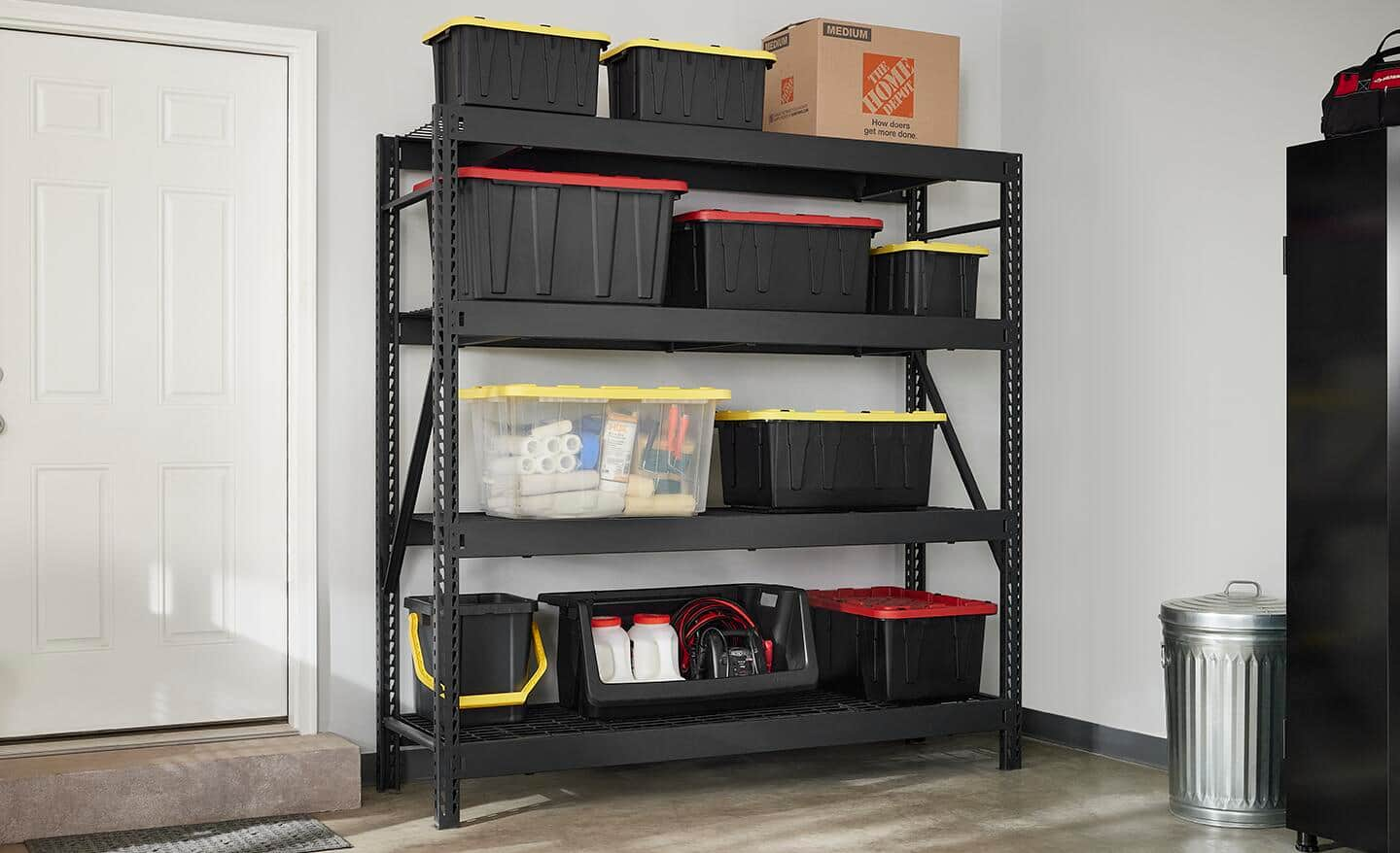 Shelves hold black storage containers with color-coded tops.