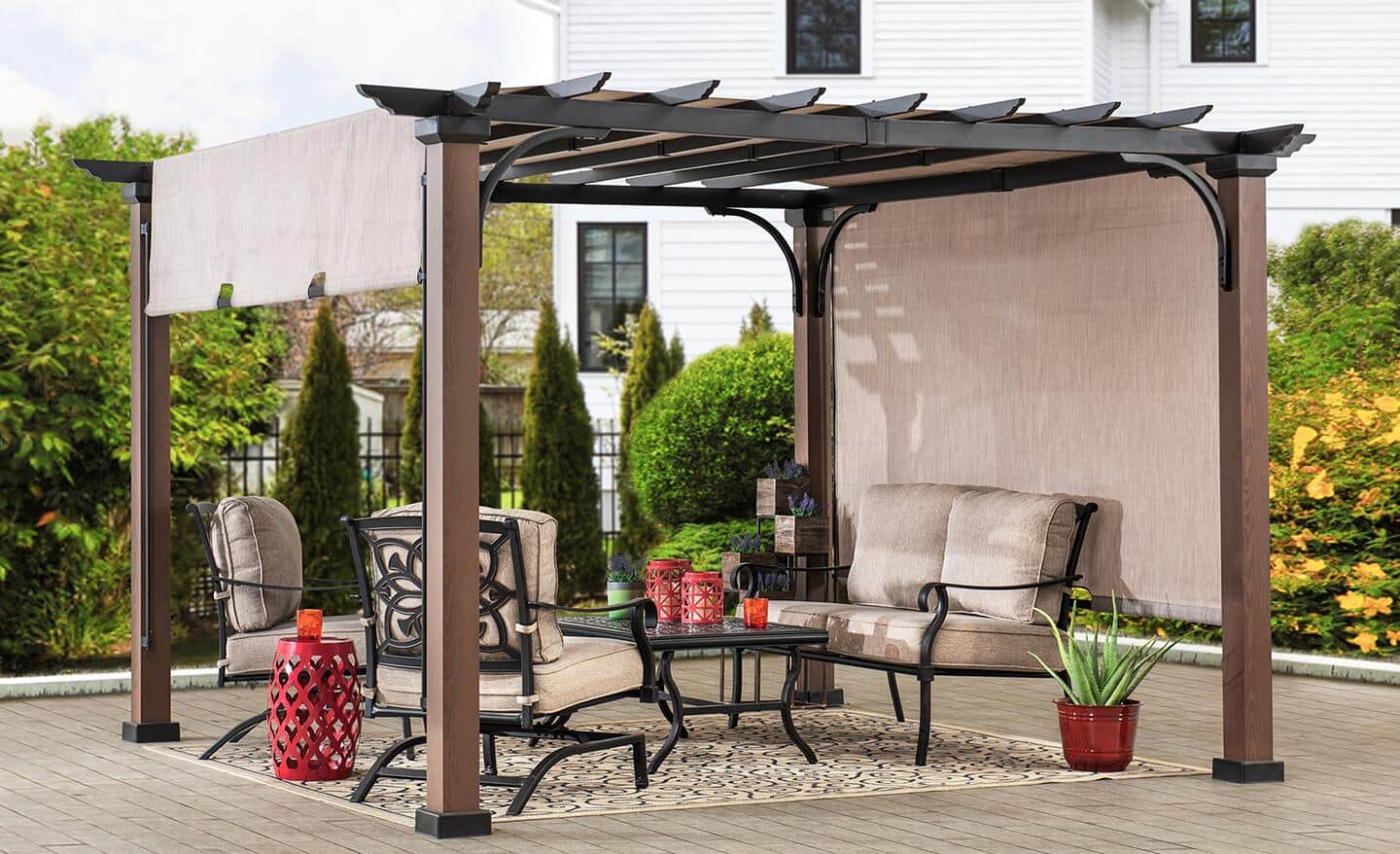 Outdoor seated area covered by a pergola