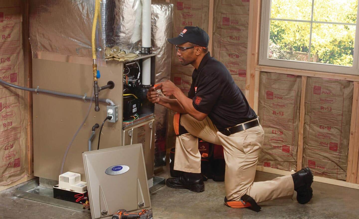 A Pro electrician converts an older HVAC system to electrical power